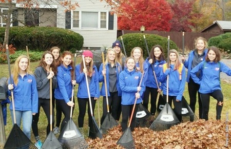 New Paltz student-athletes participate in leaf raking project